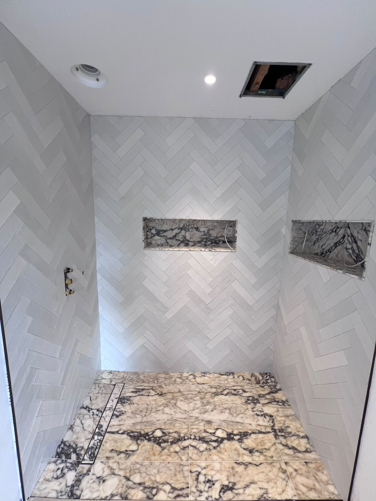 Herringbone tile installation by JB Tiling in Kent