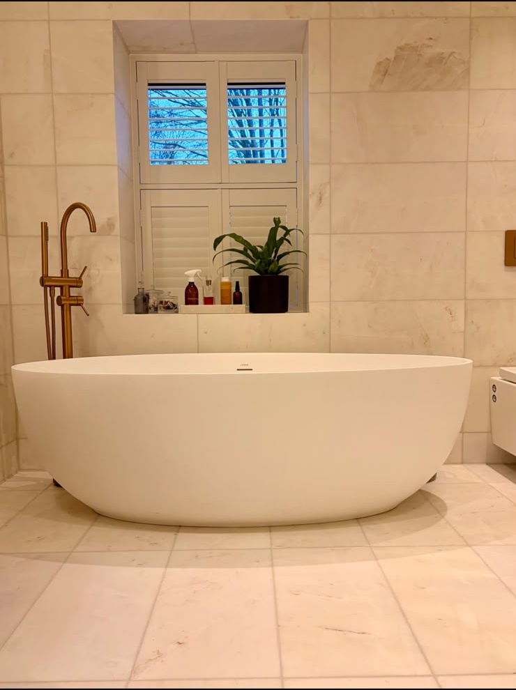 Natural stone tiling in marble and limestone in Kent