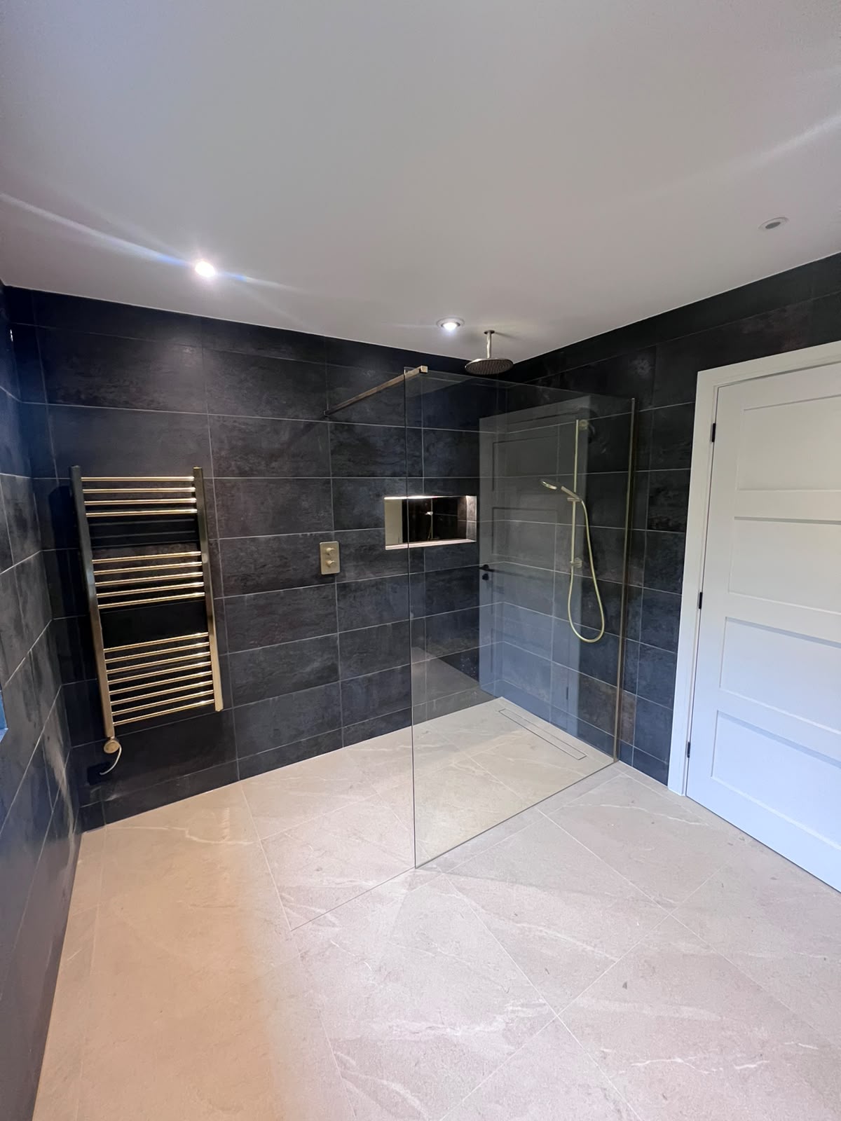 Wetroom tiling and installation in Kent with walk-in tiled shower